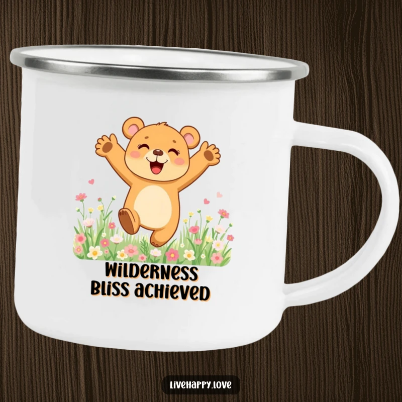 Funny camping mug featuring a happy bear cub leaping joyfully through a beautiful field of colorful flowers, perfect for outdoor enjoyment.