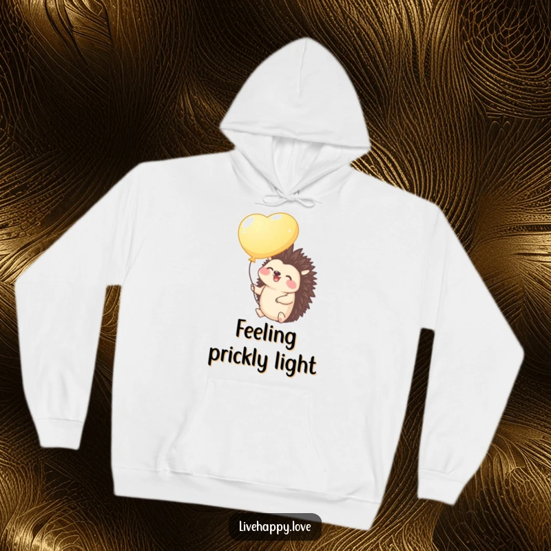 Funny Hedgehog Hoodie: Features a giggling hedgehog holding a bright balloon, gently floating upwards with pure joy and a light heart.