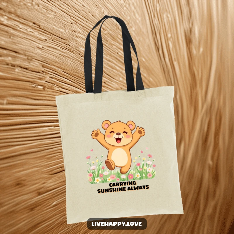 Funny tote bag featuring a happy bear cub mid-leap in a beautiful field bursting with colorful flowers, exuding pure delight.